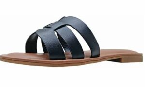 Sandales à glissière plates Monika à bande en H The Drop pour femmes