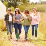 Fun things to do with friends over 50 - out for a walk at a campsite
